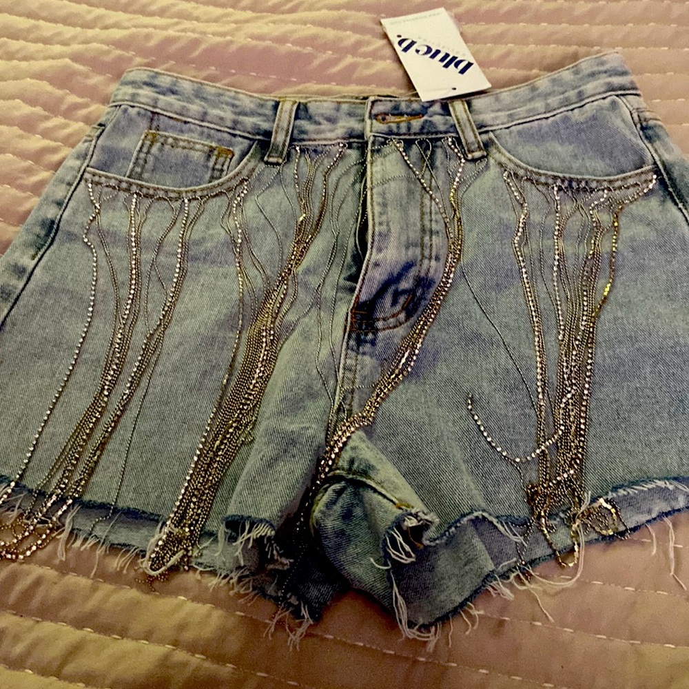 Size S blue jeans shorts with crysodiamonds hanging down! Needs a jeans button